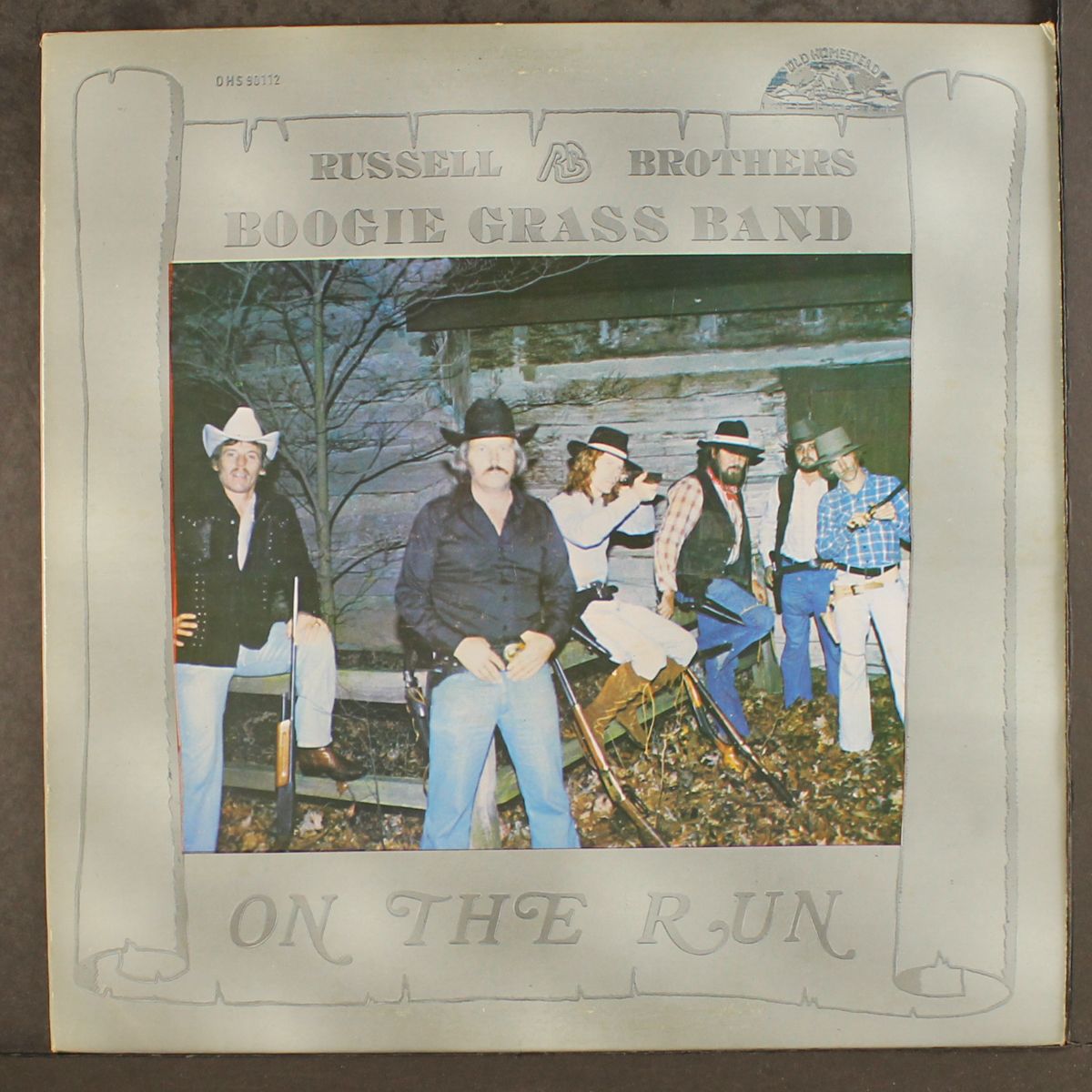 boogie grass band- on the run by RUSSELL BROTHERS