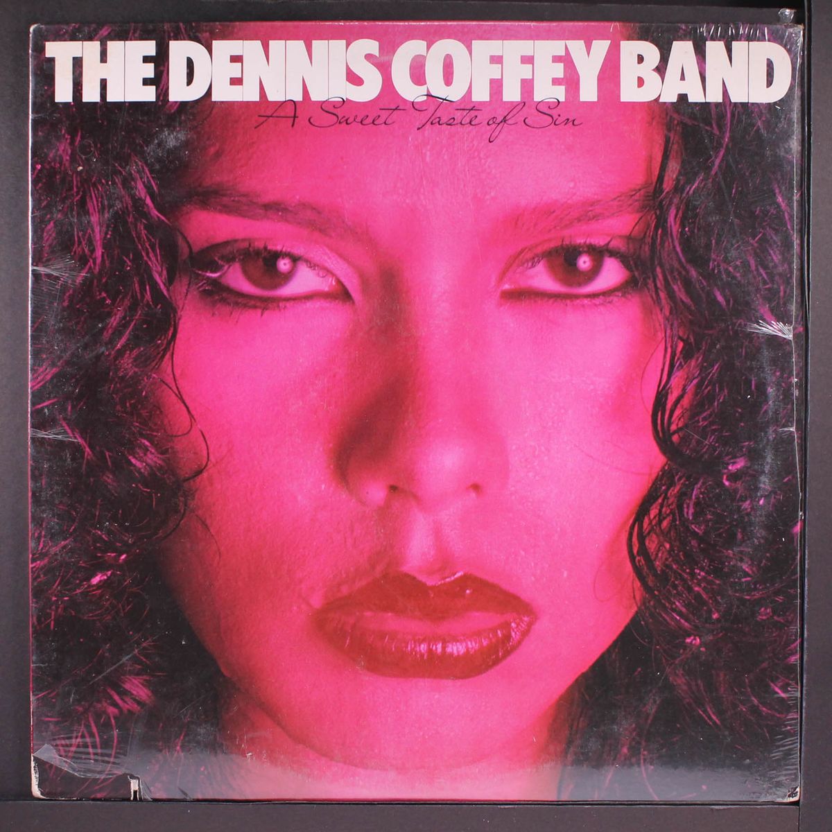 a sweet taste of sin by DENNIS COFFEY