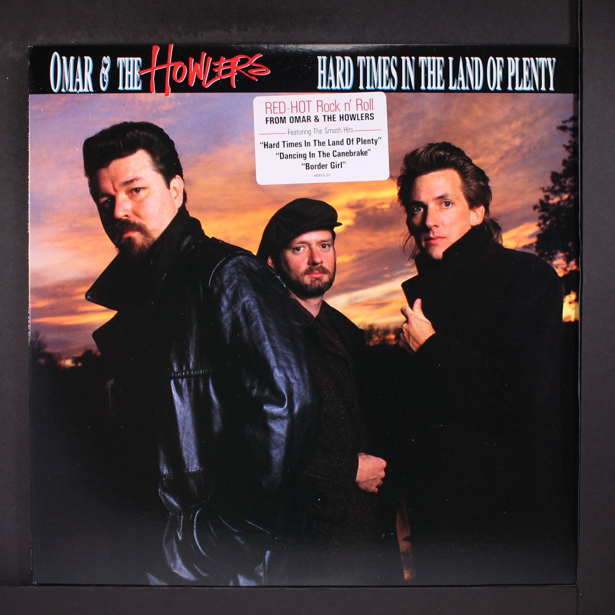 hard times in the land of plenty by OMAR & HOWLERS
