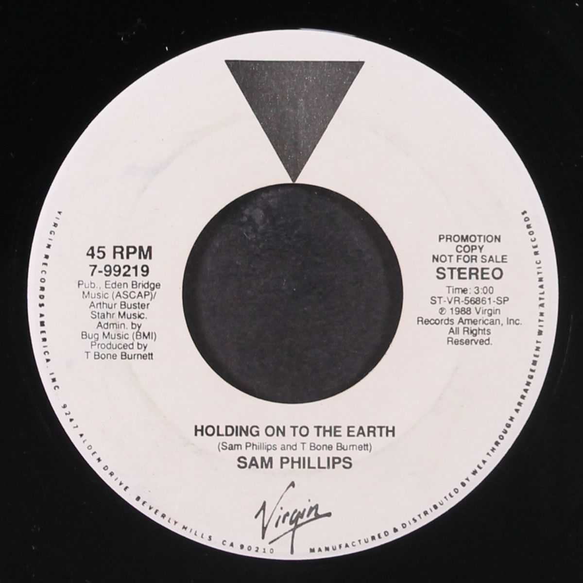holding on to the earth by SAM PHILLIPS