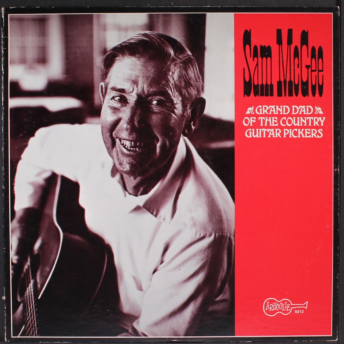 grand dad of the country guitar pickers by SAM MCGEE