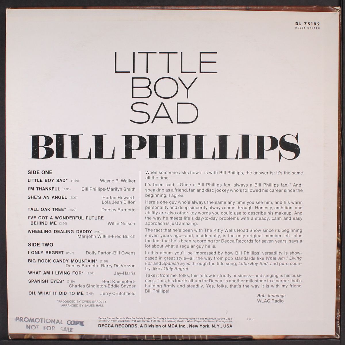 little boy sad by BILL PHILLIPS