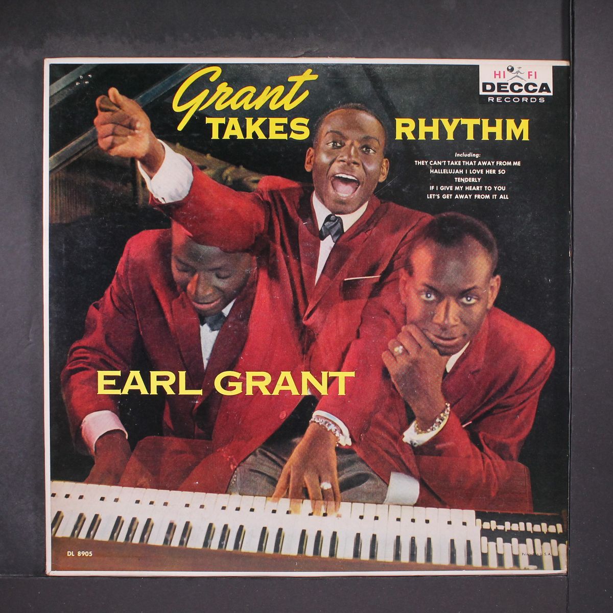 grant takes rhythm by EARL GRANT