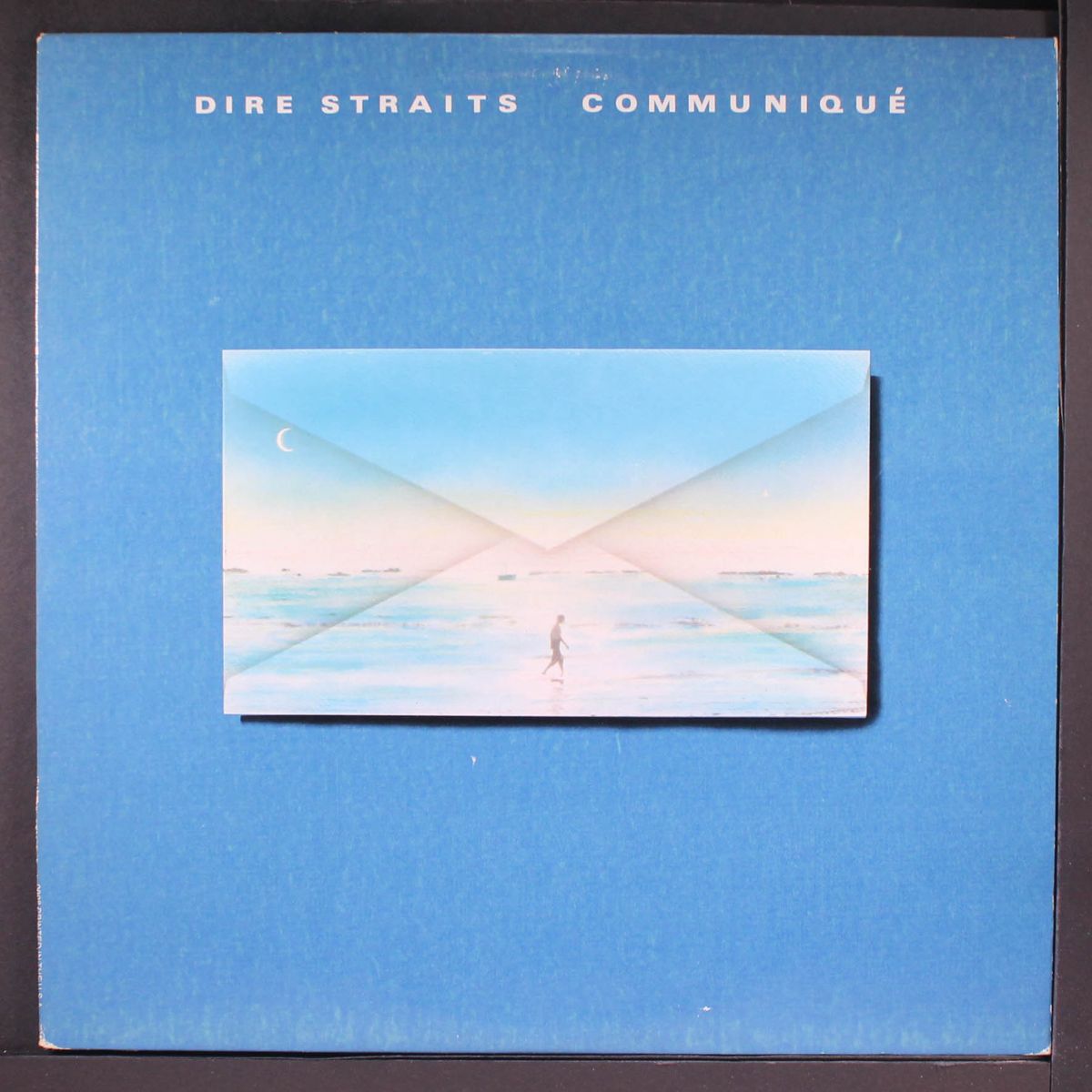 communique by DIRE STRAITS