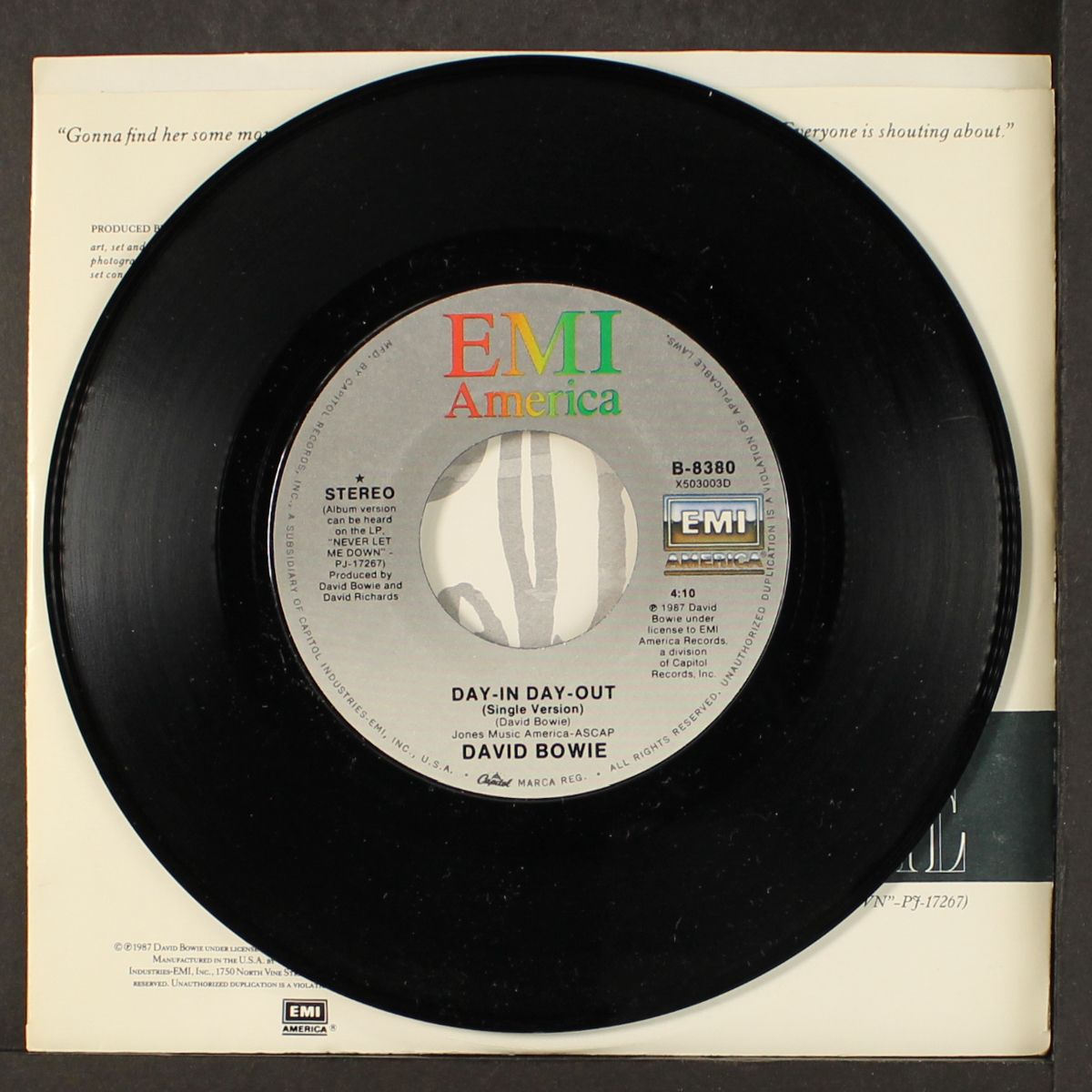 day-in day-out by DAVID BOWIE