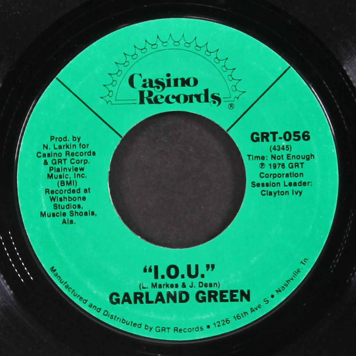 i.o.u. / it's a backdoor world by GARLAND GREEN
