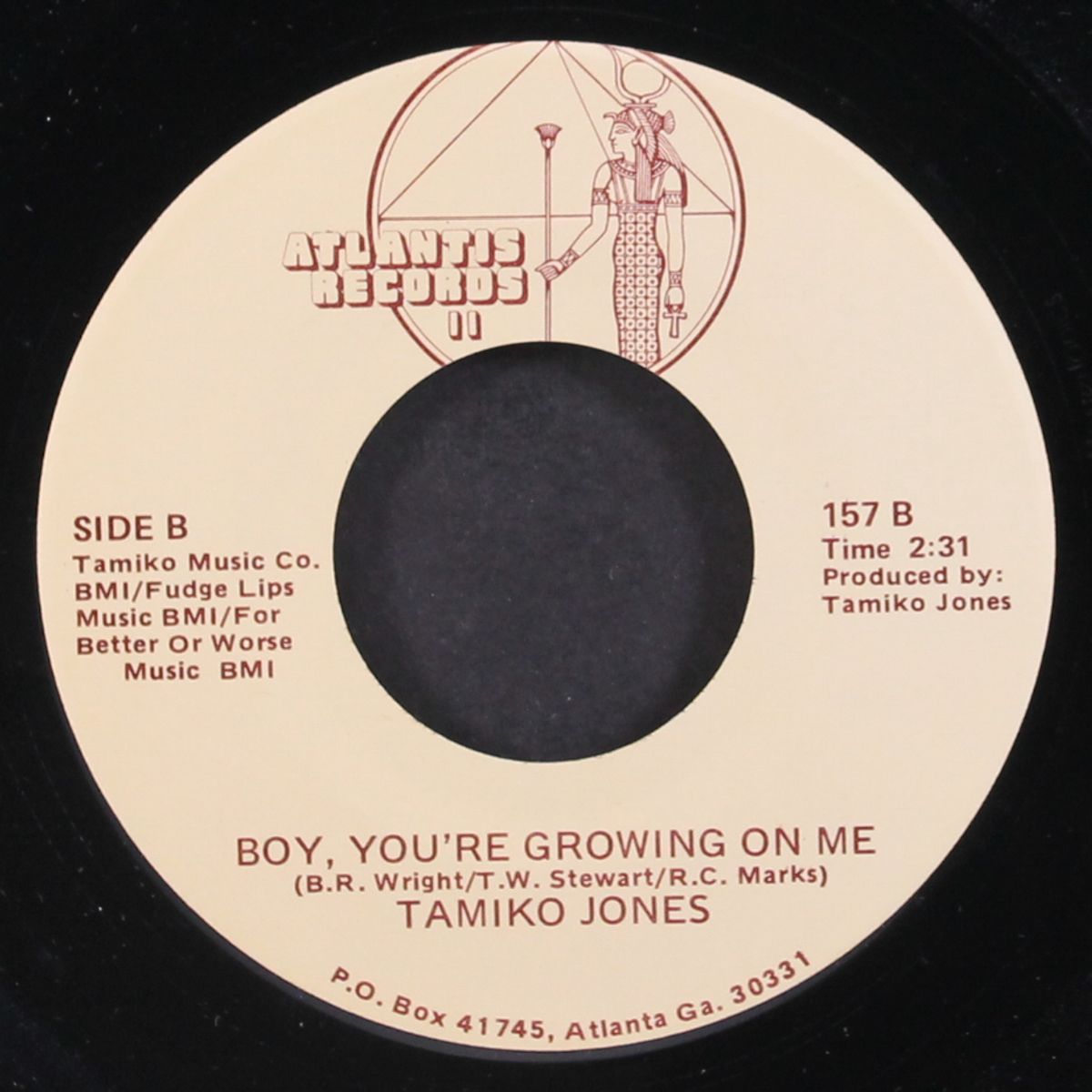ooh baby, baby / boy, you're growing on me by TAMIKO JONES