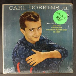 CARL DOBKINS, JR.