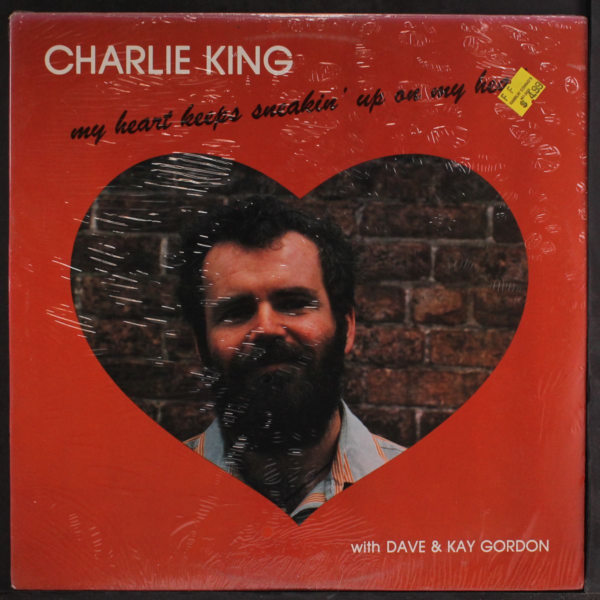 my heart keeps sneakin' up on my head by CHARLIE KING