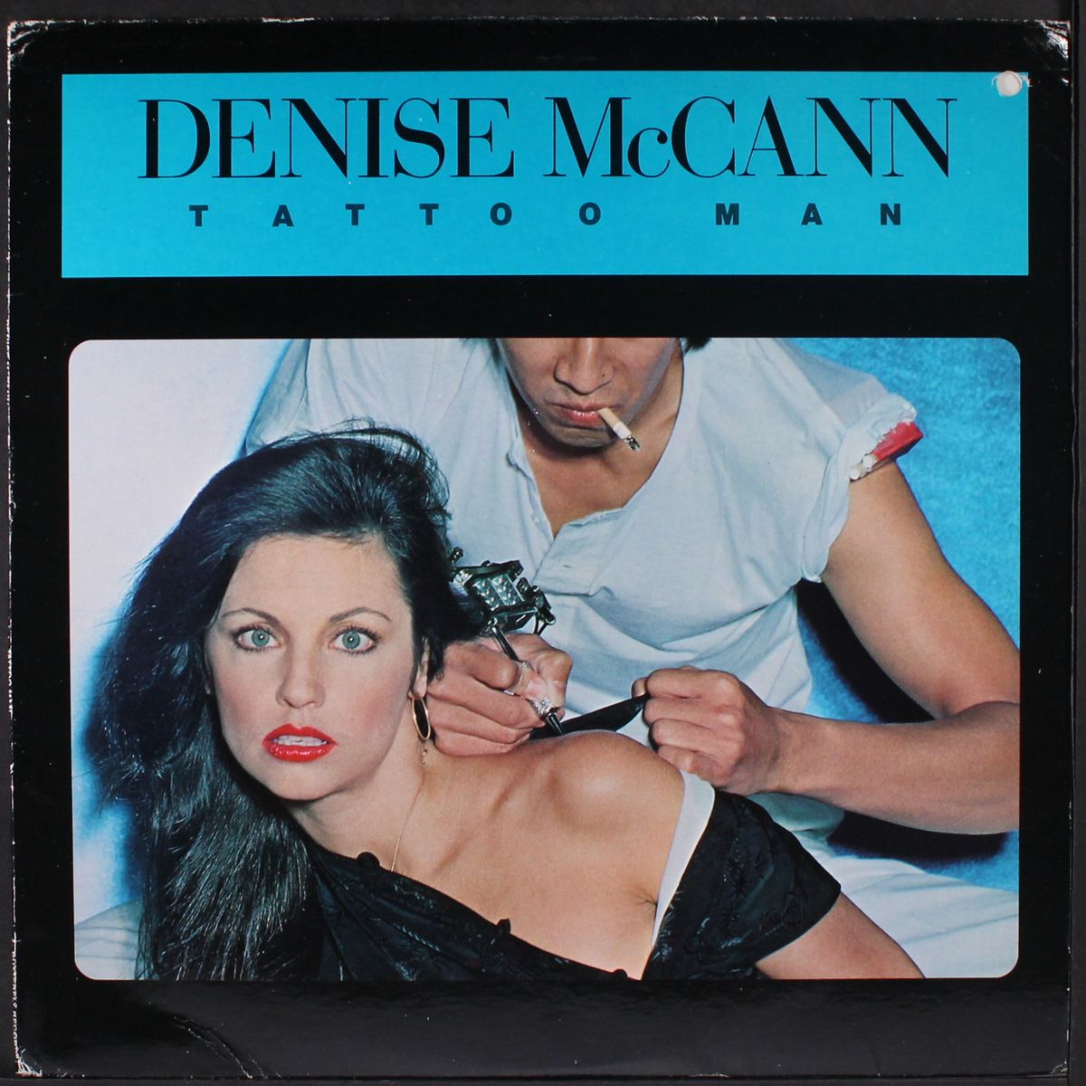 tattoo man by DENISE MCCANN