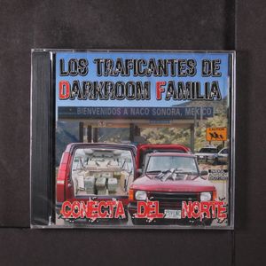LOS TRAFICANTES DE DARKROOM FAMILIA