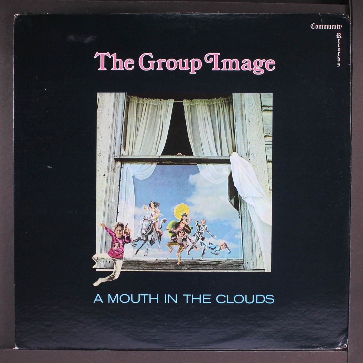 a mouth in the clouds by GROUP IMAGE