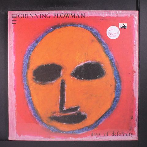 GRINNING PLOWMAN