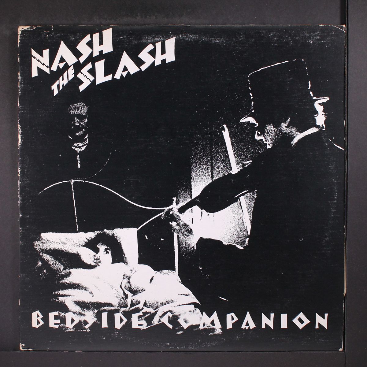 bedside companion by NASH THE SLASH