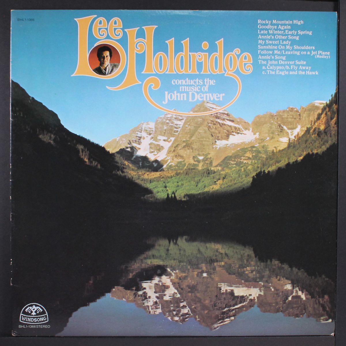 conducts the music of john denver by LEE HOLDRIDGE