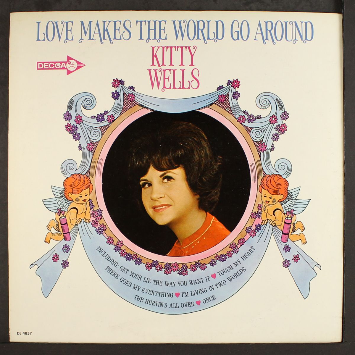 love makes the world go around by KITTY WELLS