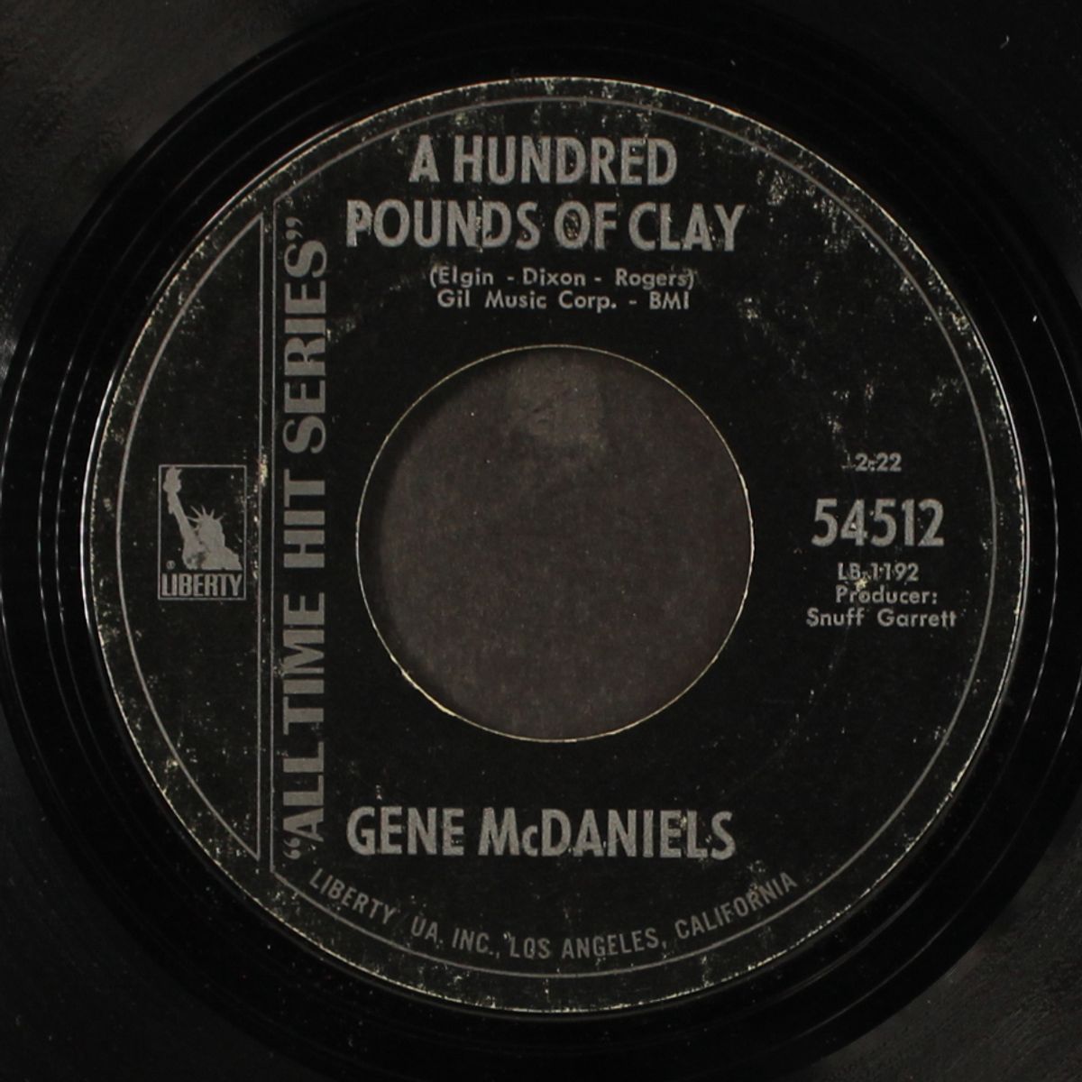 a hundred pounds of clay / tower of strength by GENE MCDANIELS