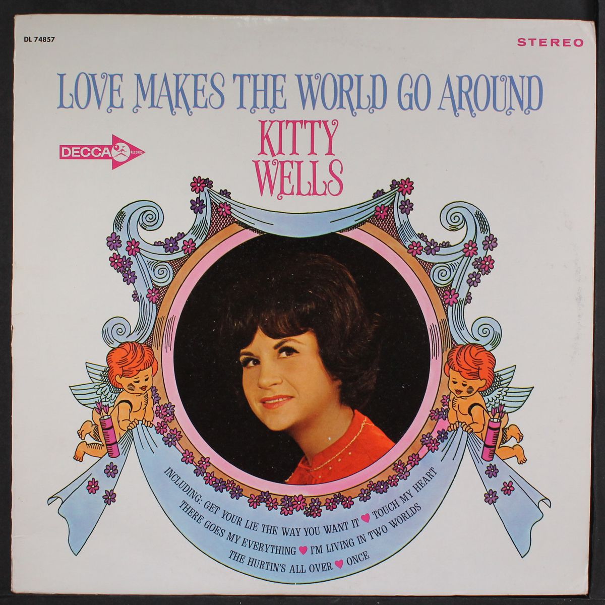 love makes the world go around by KITTY WELLS