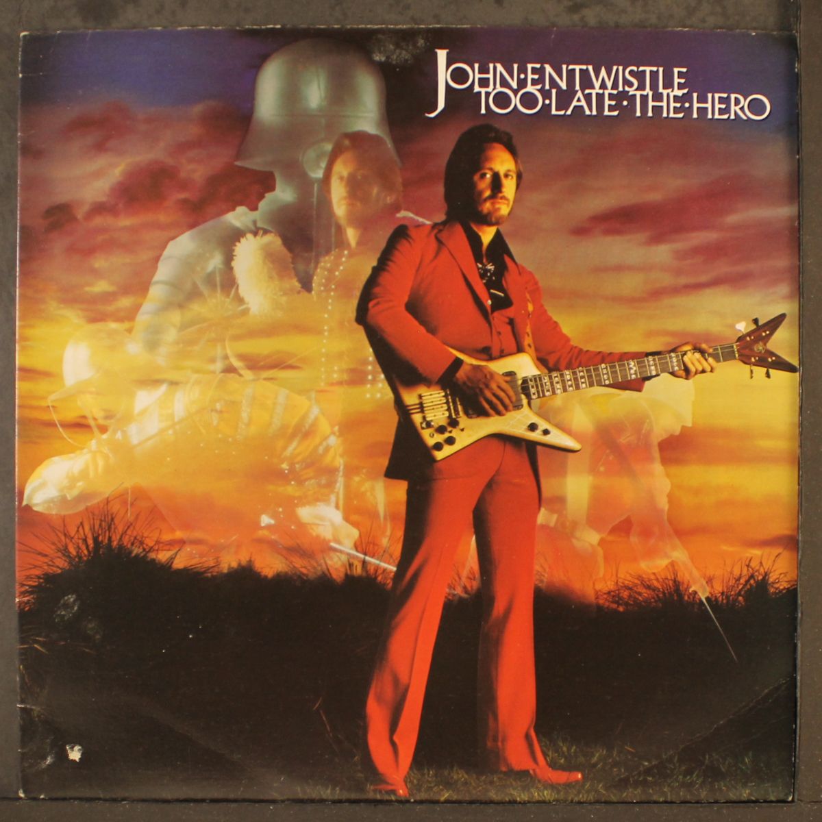 too late the hero by JOHN ENTWISTLE