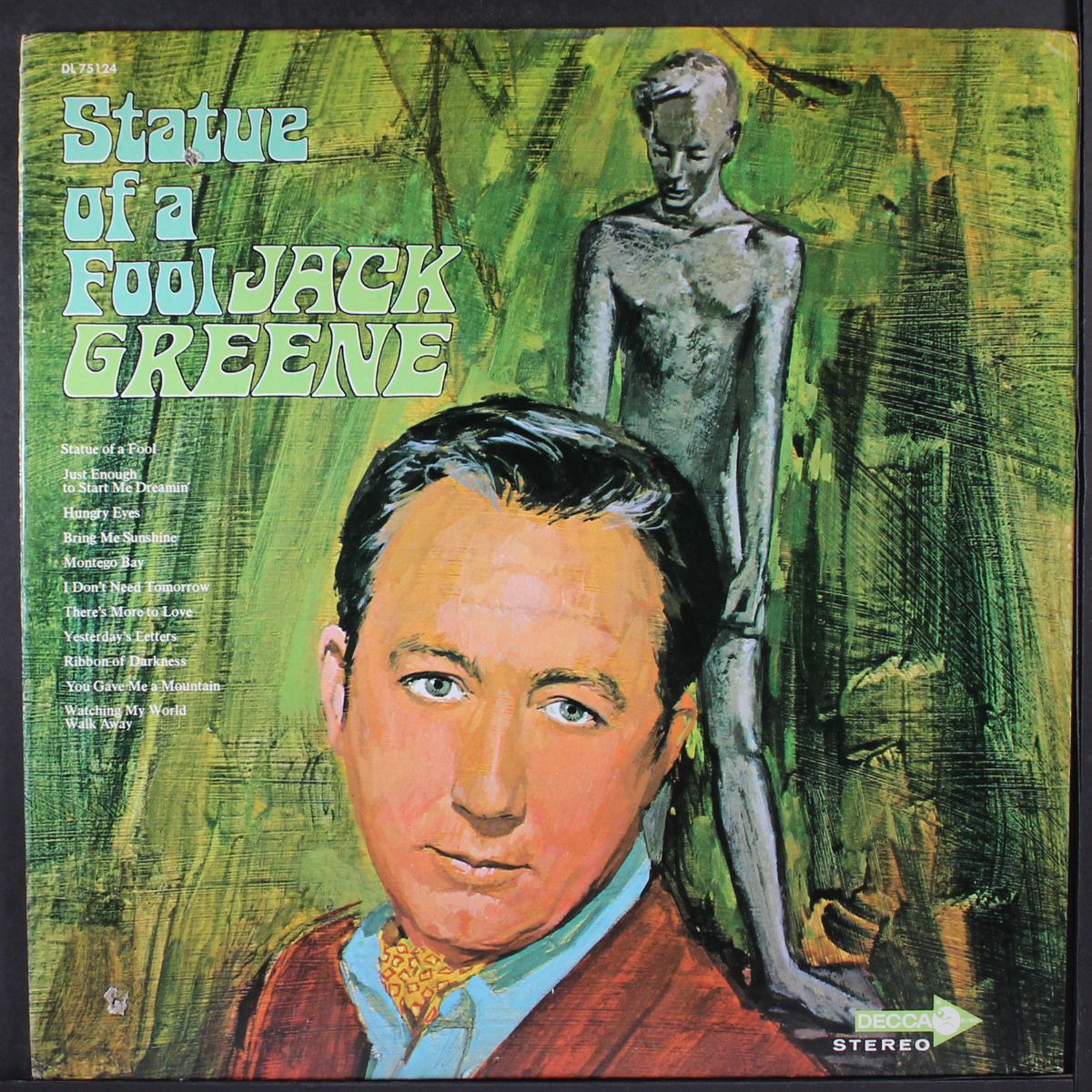 statue of a fool by JACK GREENE