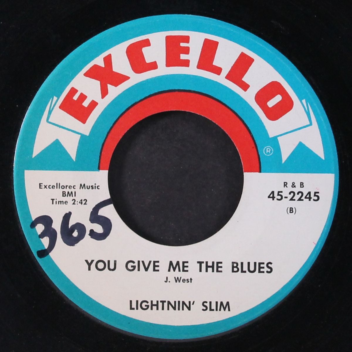 the strangest feelin' / you give me the blues by LIGHTNIN' SLIM