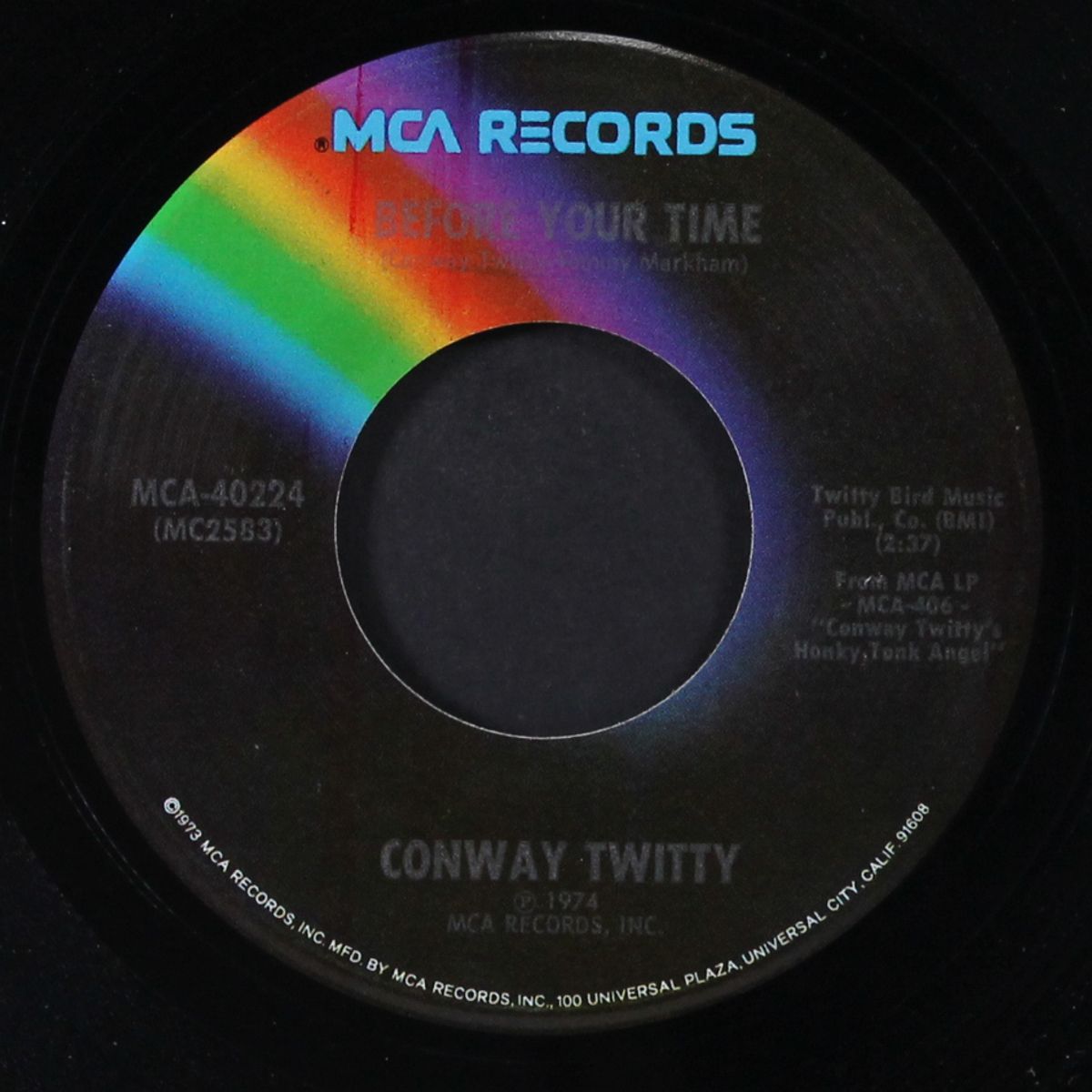 i'm not through loving you yet / before your time by CONWAY TWITTY