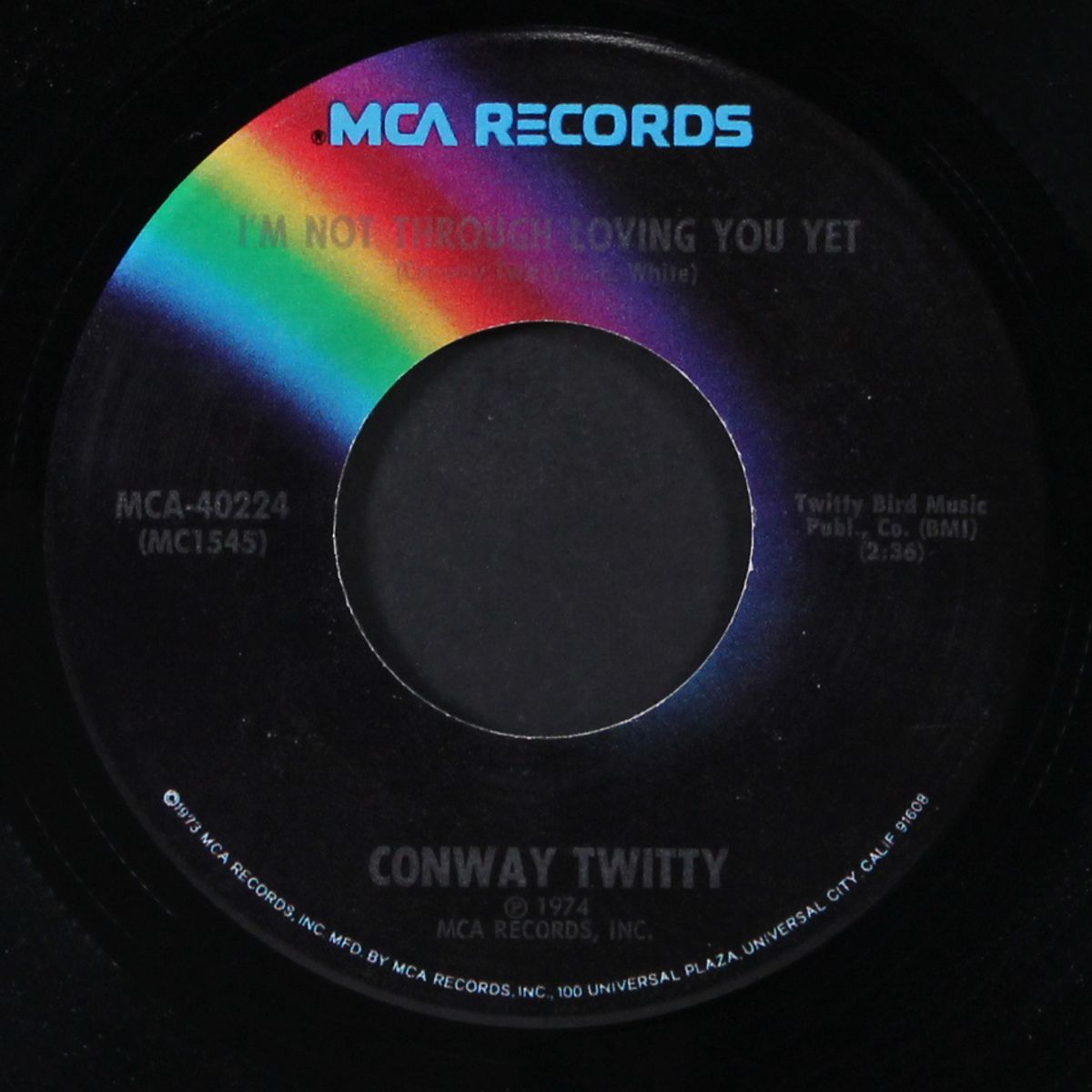 i'm not through loving you yet / before your time by CONWAY TWITTY