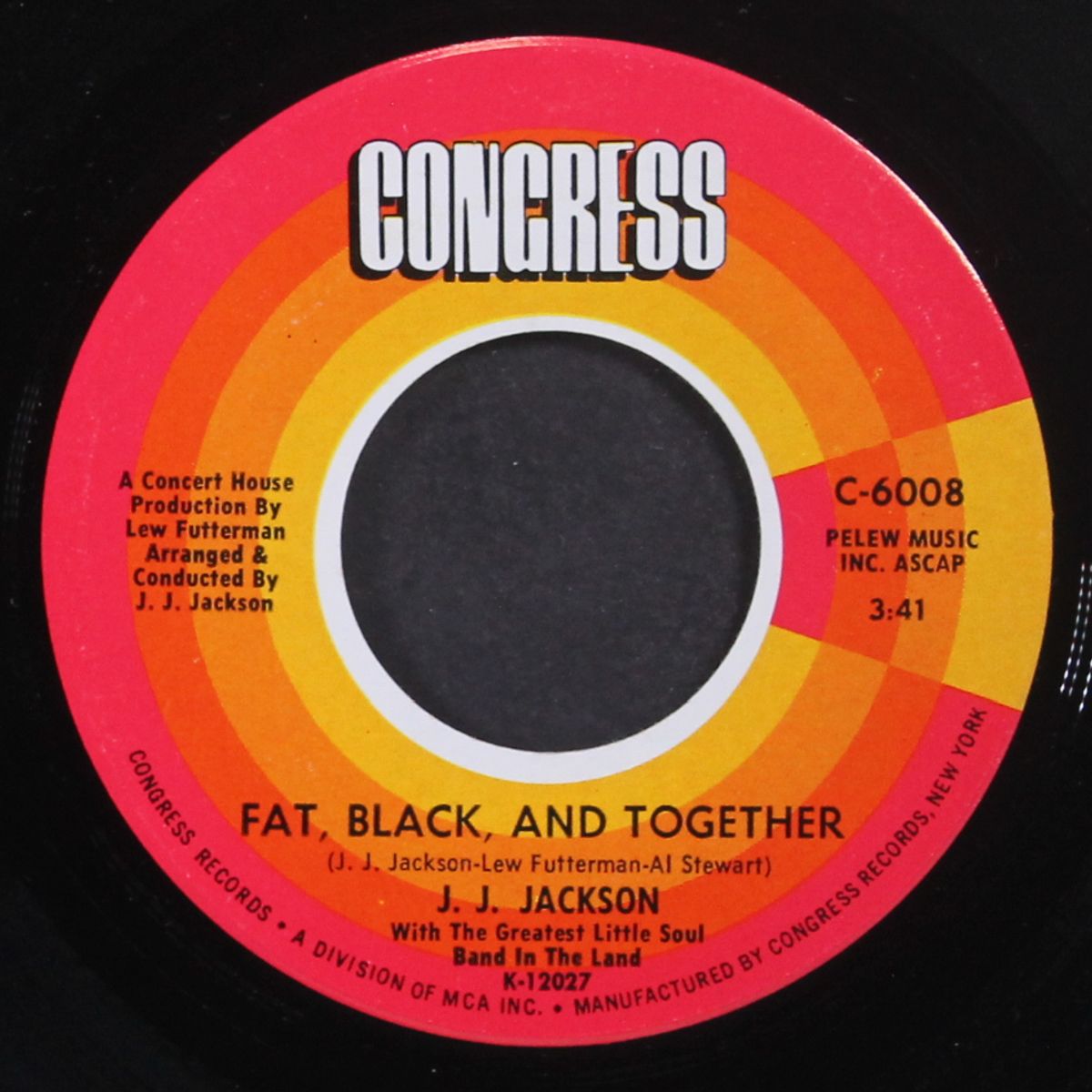 that's woman loving her man / fat, black and together by J.J. JACKSON