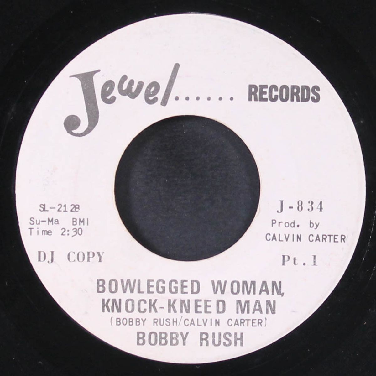 bowlegged woman, knock-kneed man by BOBBY RUSH
