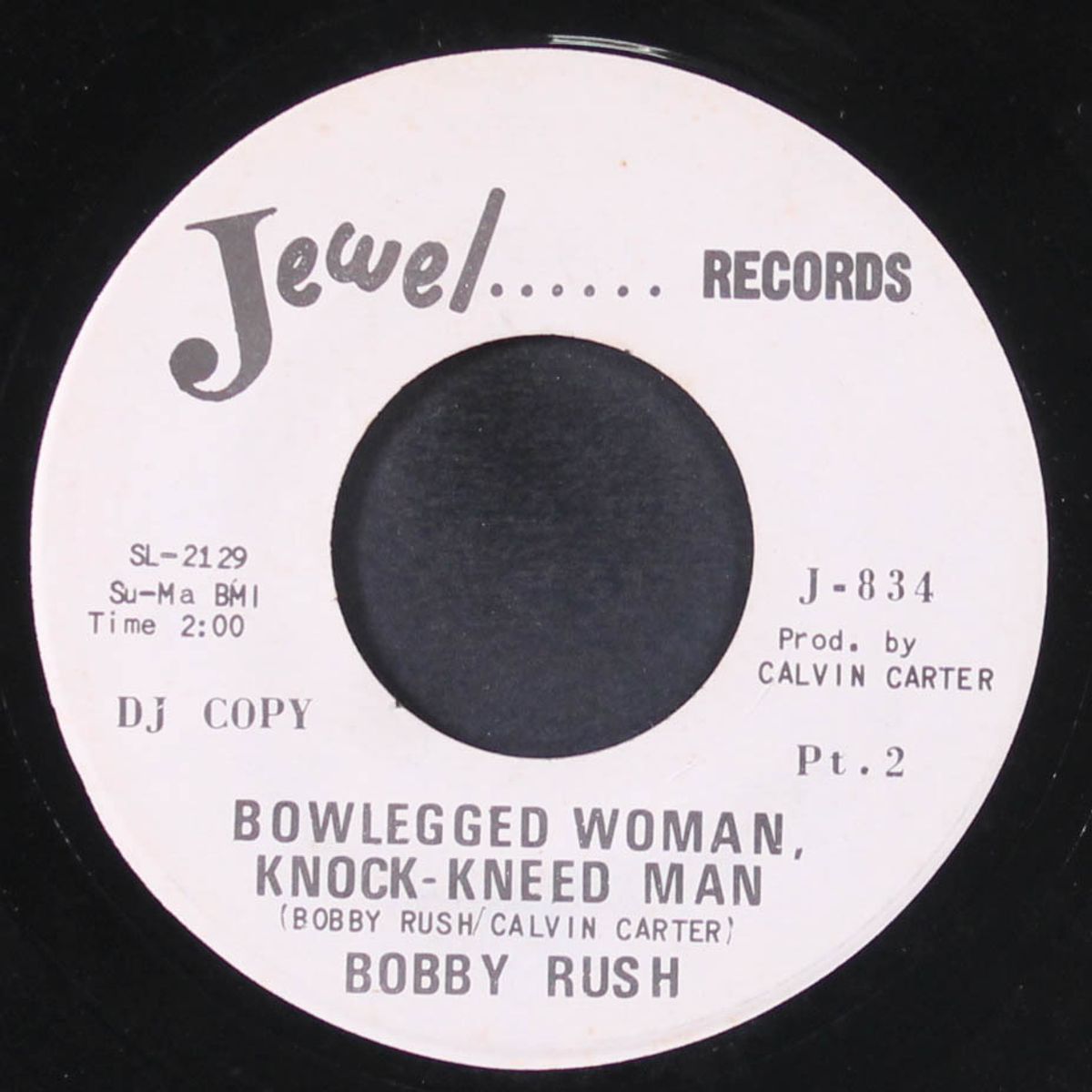 bowlegged woman, knock-kneed man by BOBBY RUSH