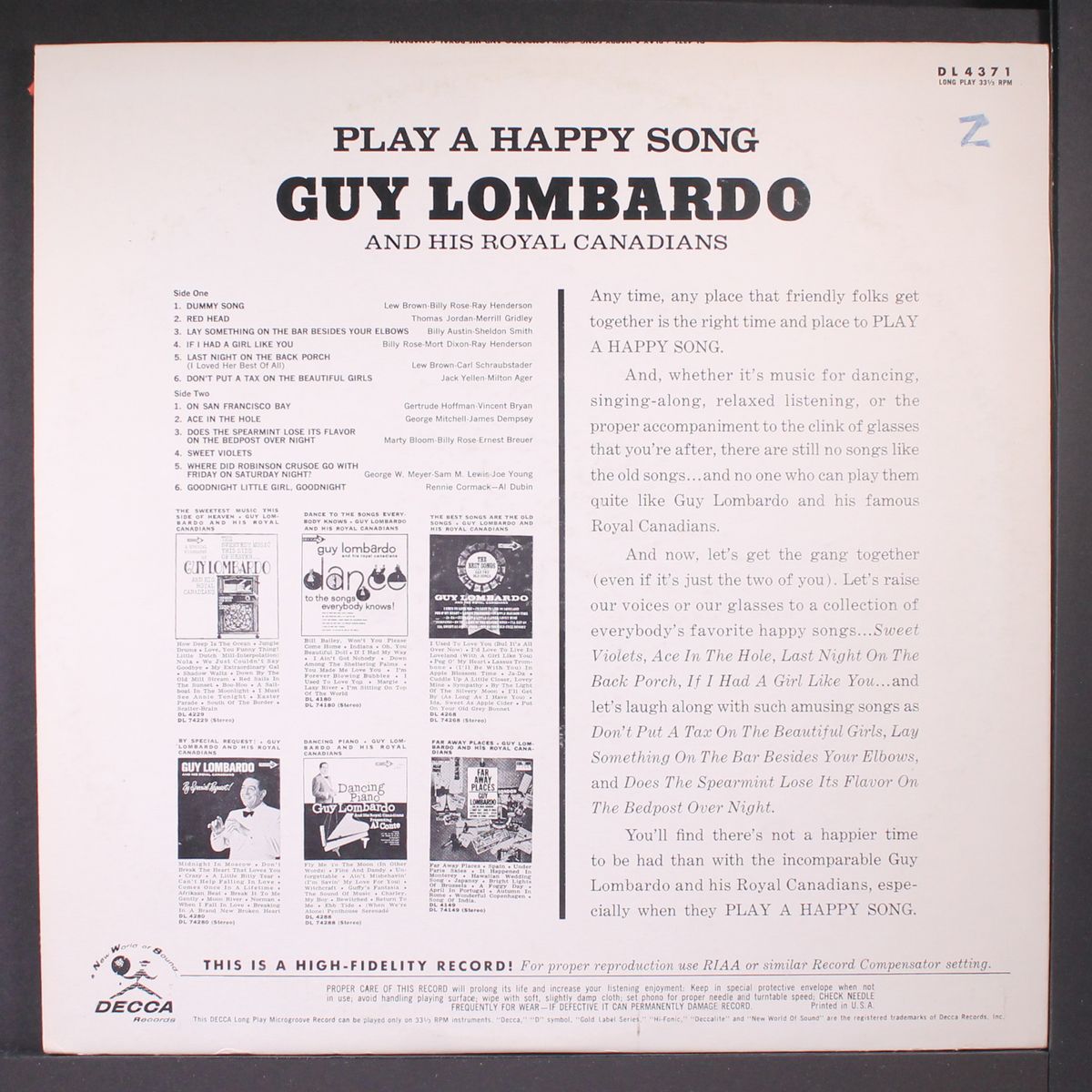 play a happy song by GUY LOMBARDO