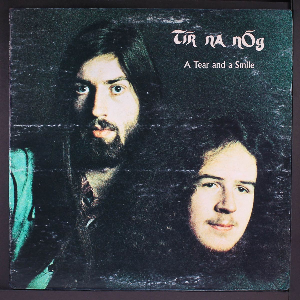 a tear and a smile by TIR NA NOG
