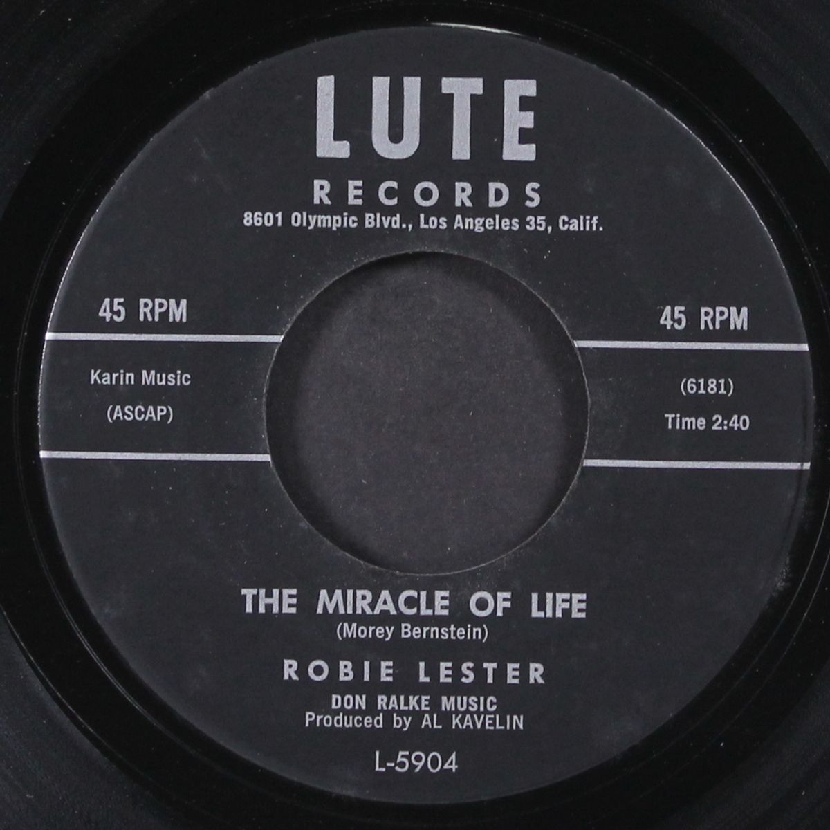 the miracle of life / the ballad of cheatin' john by ROBIE LESTER