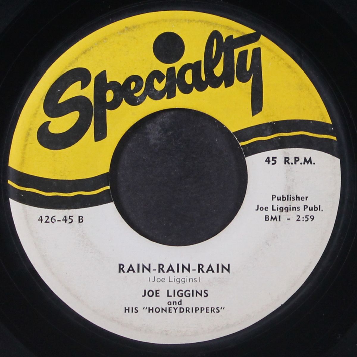 boogie woogie lou / rain rain rain by JOE LIGGINS