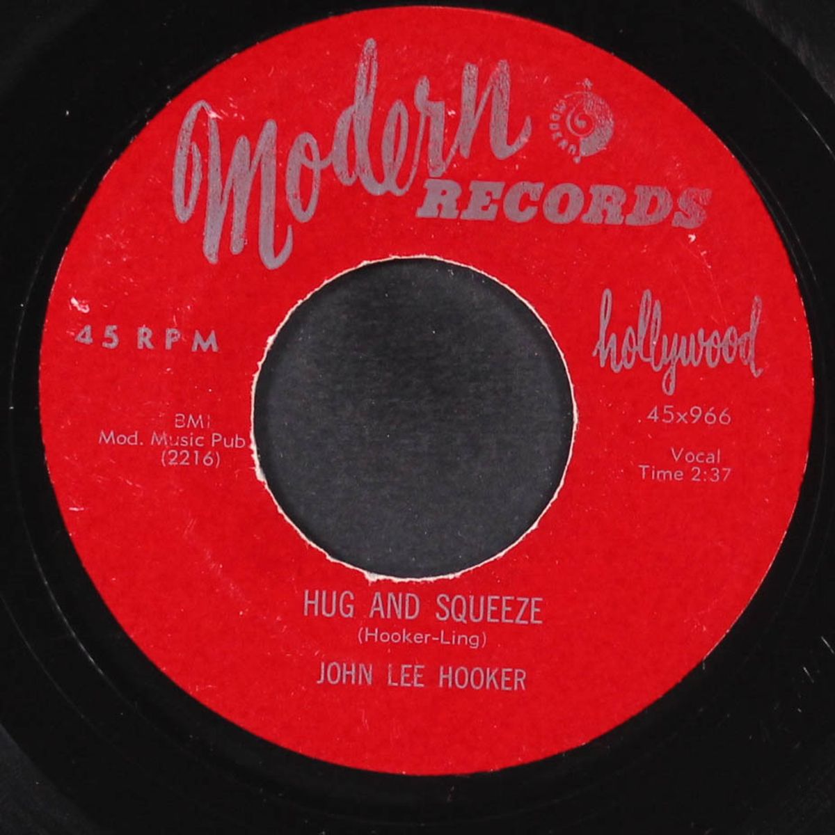 the syndicator / hug and squeeze by JOHN LEE HOOKER