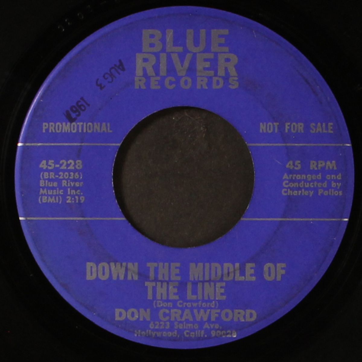 down the middle of the line by DON CRAWFORD