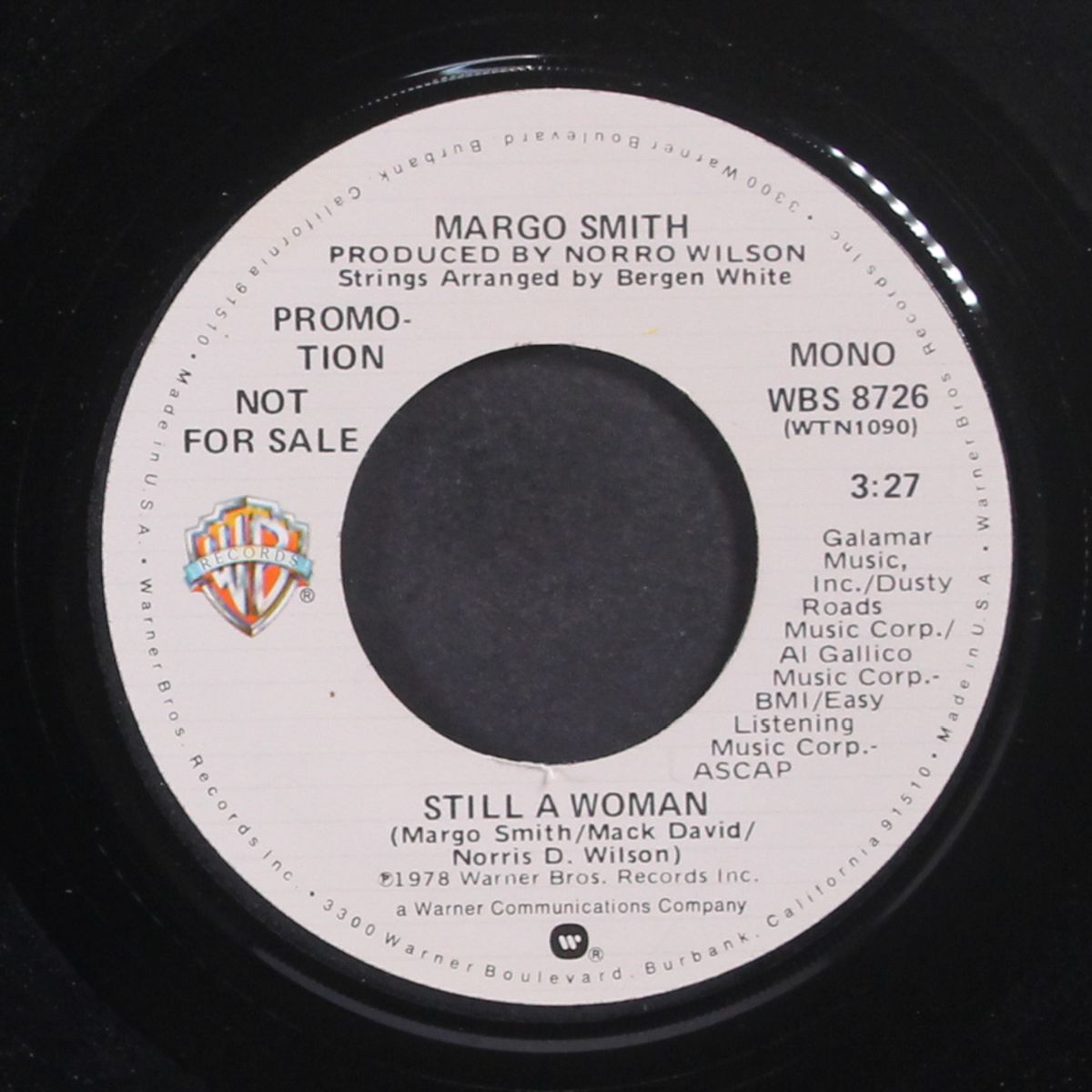 still a woman / mono by MARGO SMITH