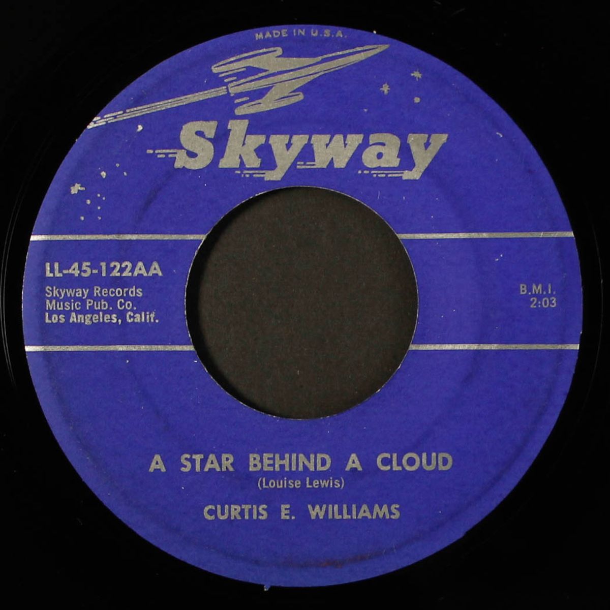 a star behind a cloud / hula hula rock by CURTIS E. WILLIAMS