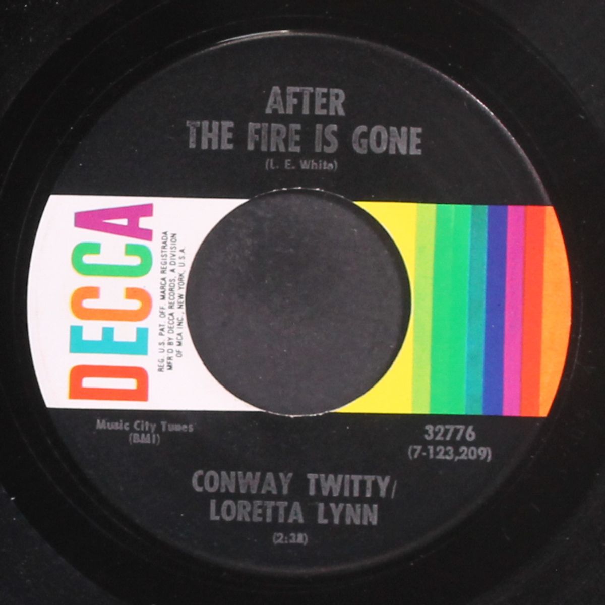 after the fire is gone by CONWAY TWITTY & LORETTA LYNN