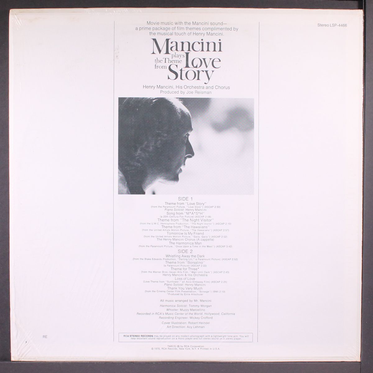 plays the theme from love story by HENRY MANCINI