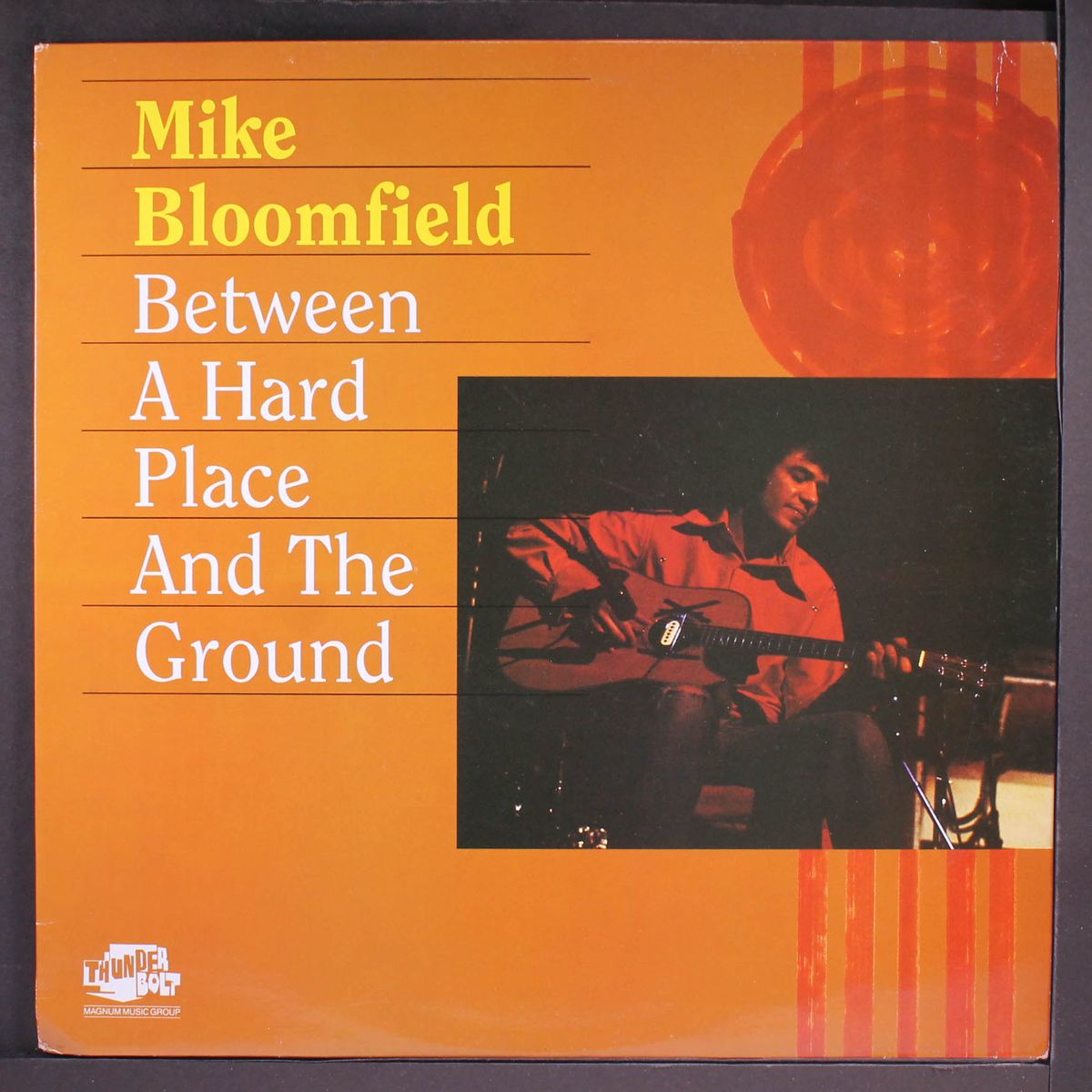 between the hard place and the ground by MICHAEL BLOOMFIELD
