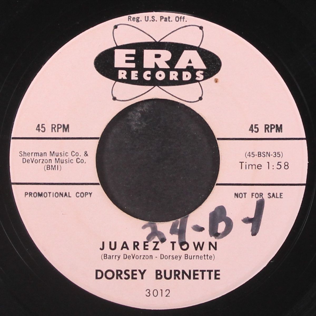 tall oak tree / juarez town by DORSEY BURNETTE