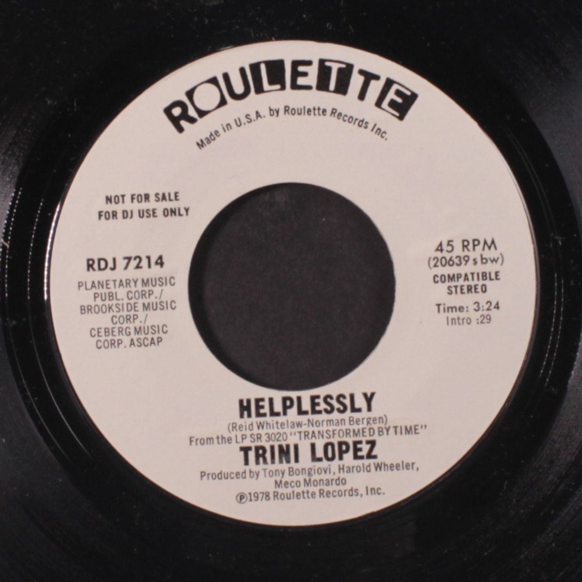 helplessly / mono by TRINI LOPEZ