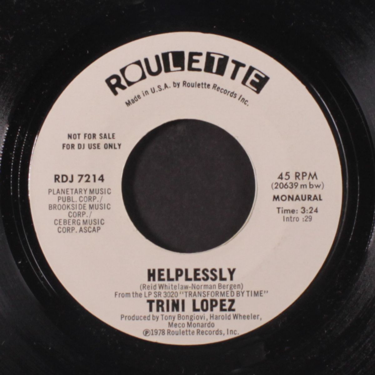 helplessly / mono by TRINI LOPEZ