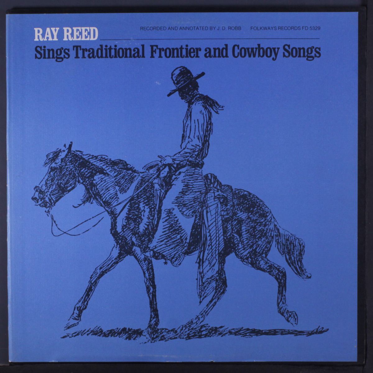 sings traditional frontier and cowboy songs by RAY REED