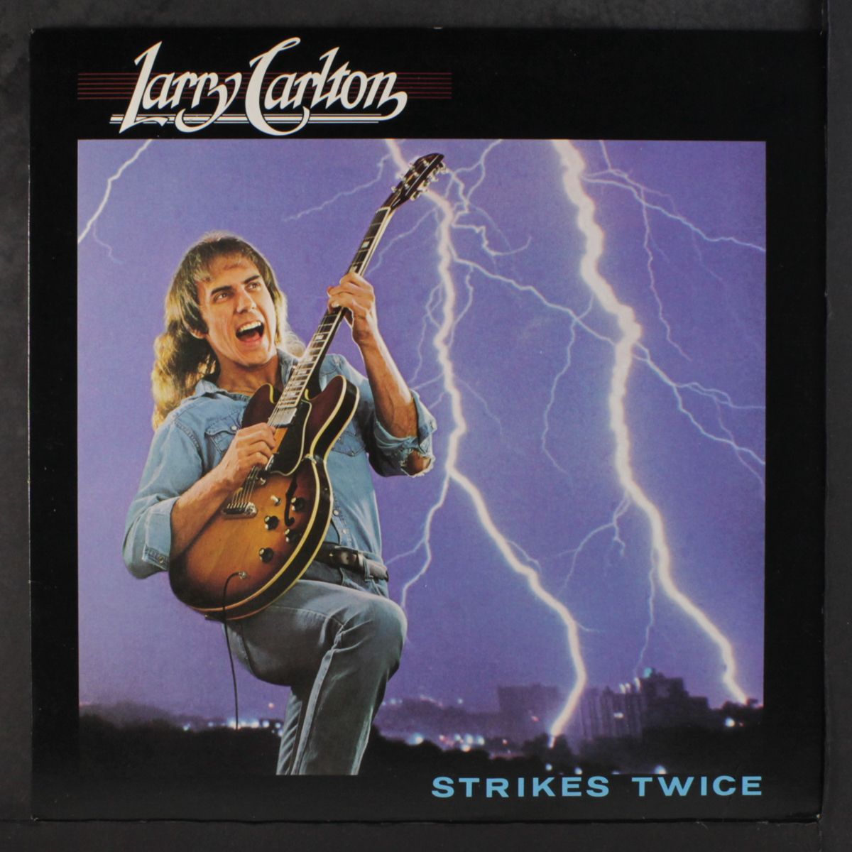 strikes twice by LARRY CARLTON