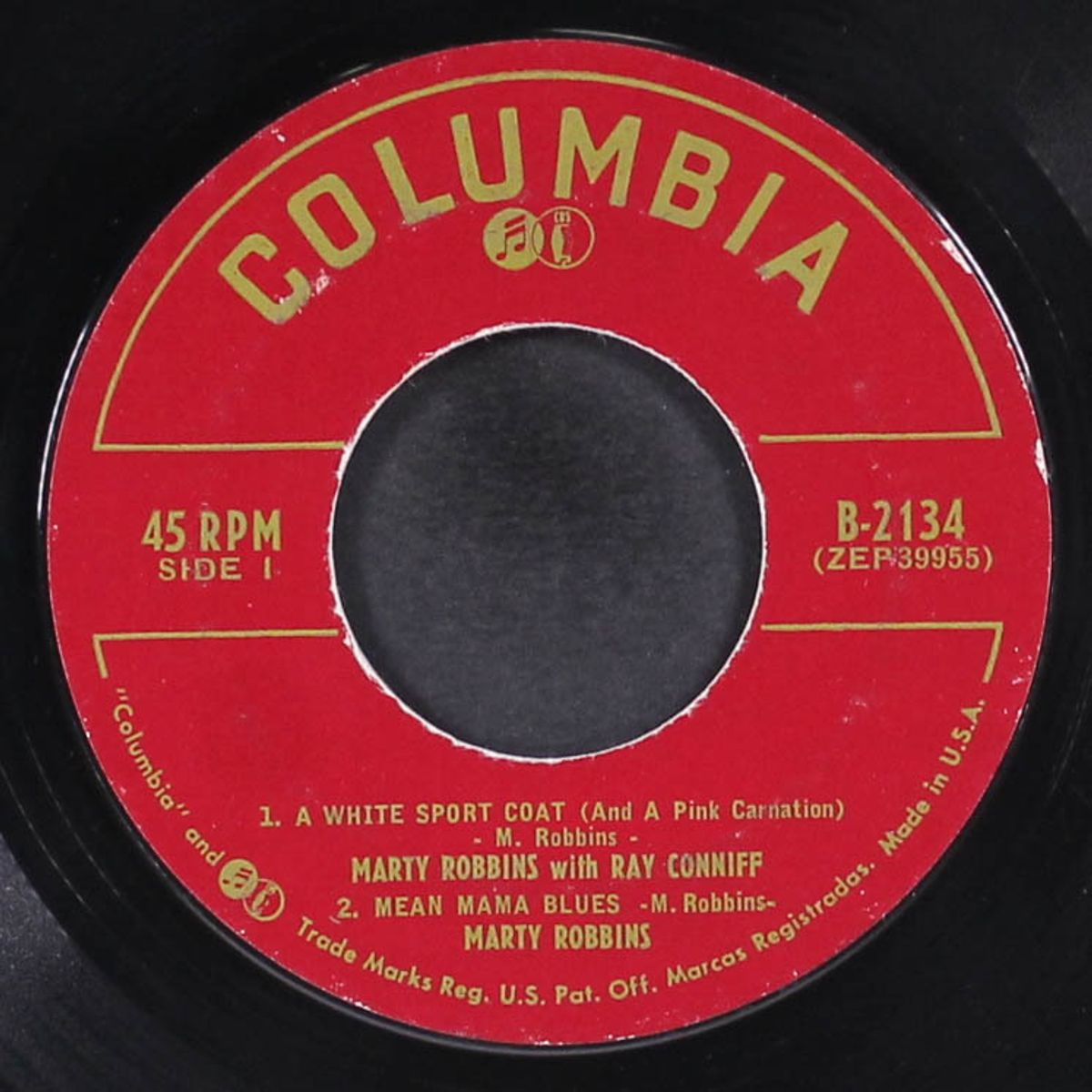 a white sport coat by MARTY ROBBINS