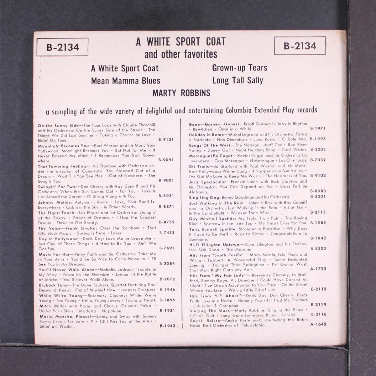 a white sport coat by MARTY ROBBINS