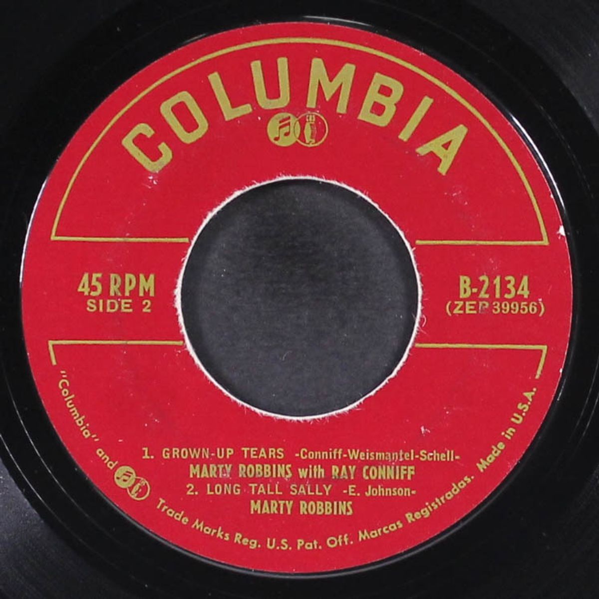 a white sport coat by MARTY ROBBINS
