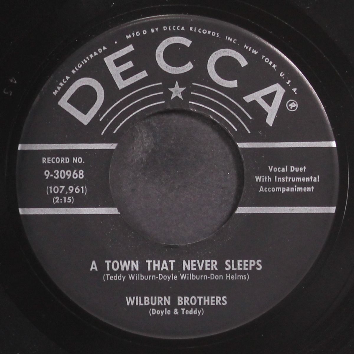 a town that never sleeps by WILBURN BROTHERS